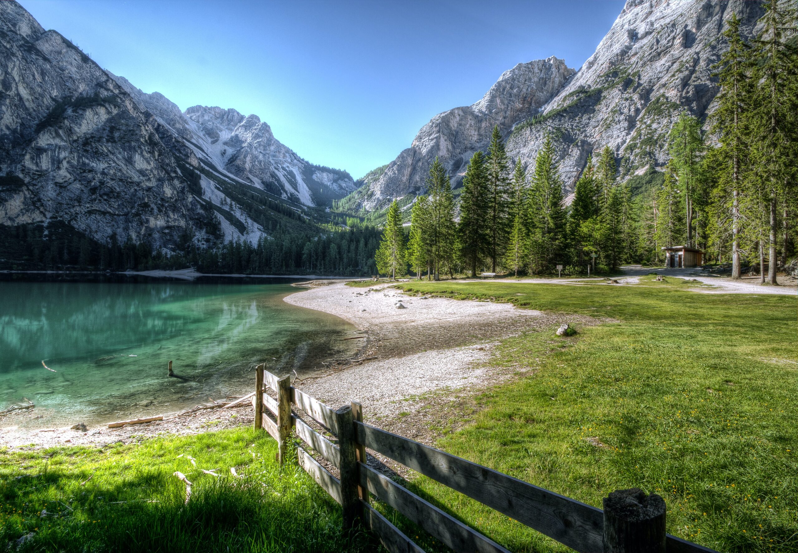Nature picture with fence and mountains